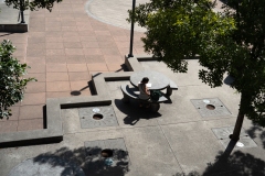 Student at table outside Laney College library